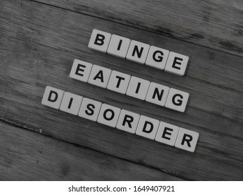 Binge Eating Disorder, Word Cube With Background.