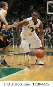 BINGHAMTON, NY-  FEBRUARY 28: Binhamton's No. 3 Jordan Reed Drives To The Basket Against Vermont At The Events Center February 28, 2013 In Binghamton, NY