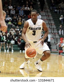 BINGHAMTON, NY-  FEBRUARY 28: Binhamton's No. 3 Jordan Reed Dribbles Against Vermont At The Events Center February 28, 2013 In Binghamton, NY