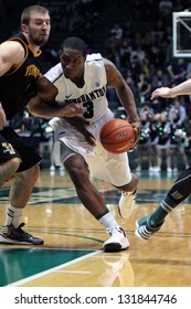 BINGHAMTON, NY-  FEBRUARY 28: Binhamton's  No. 3 Jordan Reed Drives To The Basket Against Vermont At The Events Center February 28, 2013 In Binghamton, NY