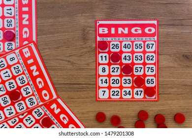 Bingo Card Top view on Wooden texture 