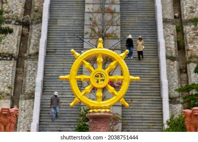 Binh Dinh, Vietnam - ‎‎March 11, 2021 : Samsara Wheel Statue With Mountain Stairway At Linh Phong Pagoda.