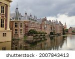 The Binnenhof parliament buildings across the Hofvijver pond in The Hague, Holland