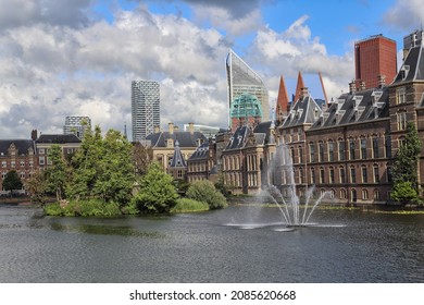The Binnenhof parliament buildings and fountain on the Hofvijver pond in The Hague, Holland