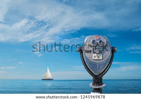 Similar – wooden platform with blue posts with ropes and orange lifebuoys on the background of the sea and sky with clouds Egypt Dahab South Sinai