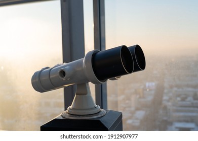Binoculars on the observation deck of a skyscraper.