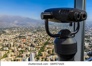 Binoculars on the viewing deck of South America's tallest building, with panoramic views, Gran Torre Santiago, or the Costanera Center Torre 2, a major tourist attraction, Santiago, Chile 12.21.17