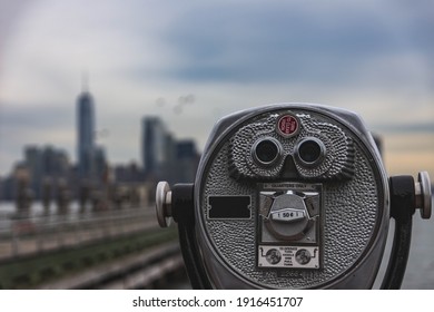 Binoculars Overlooking New York City Skyline With Bokeh