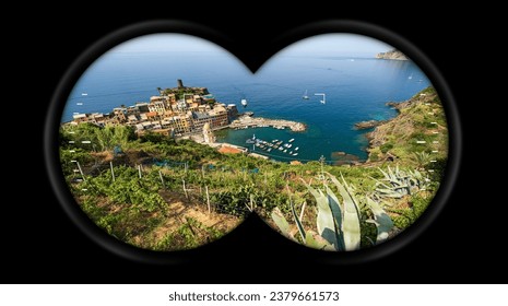 Binoculars point of view with the famous Vernazza village and the Ligurian Sea from the hill. Cinque Terre, National park in Liguria, La Spezia province, Italy, Europe. UNESCO world heritage site. - Powered by Shutterstock