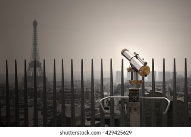 Binoculars Telescope And Paris View And Eifel Tower In The Evening