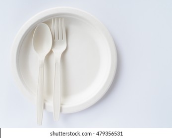 Bio Plastic Spoon And Fork On Disposable Plate