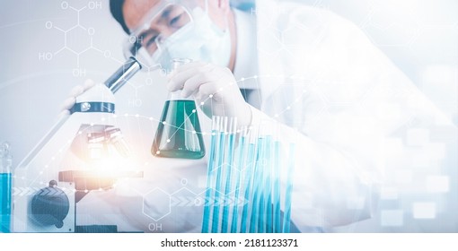 biochemical research scientist working with microscope for coronavirus, laboratory glassware containing chemical liquid for design or decorate science, chemistry, biology, medicine and people concept  - Powered by Shutterstock