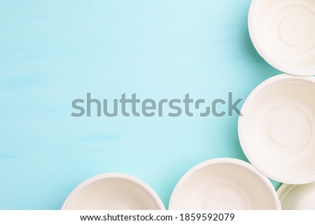 Biodegradable, Compostable, Disposable or Eco friendly bowl on pastel color background, Sustainable concept