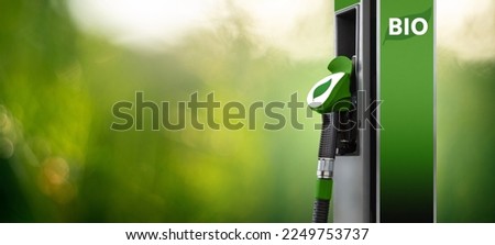 Biofuel filling station on a green background