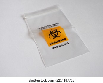 Biohazard specimen bag for disposal of covid test kit - Shutterstock ID 2214187705