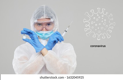 Biological hazard. Epidemic of the Chinese coronavirus. An asian woman in a protective suit and mask holds an injection syringe and vaccine. Vaccine from, flu, coronavirus, ebola, TB. 