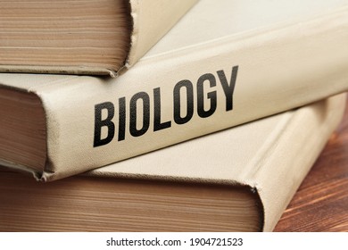 Biology Subject Book Concept On A Wooden Table For Learning