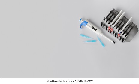 Biomedical And Biological Science Equipment Isolated On White Background. Research And Development Of Pharmaceuticals And Vaccines. Biomedical Healthcare Education. Copy Space For Text. Top View.