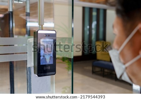 Biometric admittance control device for security system.