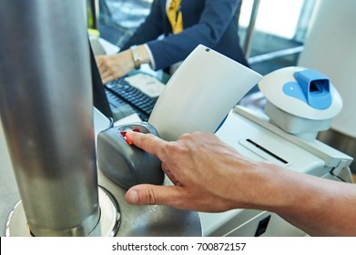 Biometric Control In Airport. Woman Puts Her Finger On Scanner At The Control Post                           