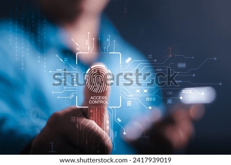 Biometric cyber security system and access control concept. Businessman access security personal financial data on scan fingerprint identification, Cybersecurity and privacy to protect data.