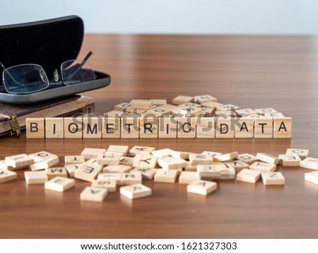 biometric data concept represented by wooden letter tiles
