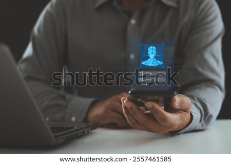 Biometric Security System. Authentication by facial recognition concept. Digital connections, data protection. Businessman scan their face with a mobile smartphone to unlock and access personal data.