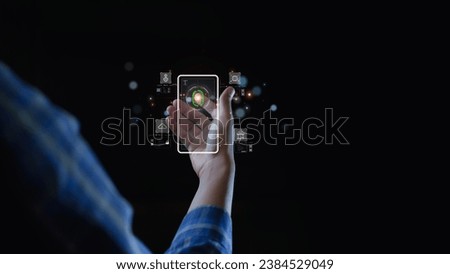 Biometric technology concept, male businessman uses hand to scan fingerprint login on abstract smartphone icon for personal data privacy.