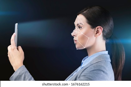 Biometric Verification Concept. Businesswoman With Smartphone Using Face ID Recognition System On Black Background, Side View