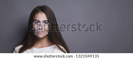 Biometric verification. Facial recognition of young woman via polygon mask on face, panorama with copy space
