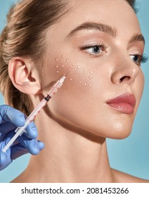Biorevitalization. Beautiful woman getting beauty injections with hyaluronic acid for smoothing of face mimic wrinkles. Anti-aging procedure - Shutterstock ID 2081453266