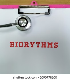 Biorhythm Word Isolated On Notepad With Stethoscope.