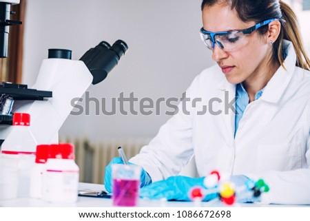 Biotechnology research, woman working in the lab