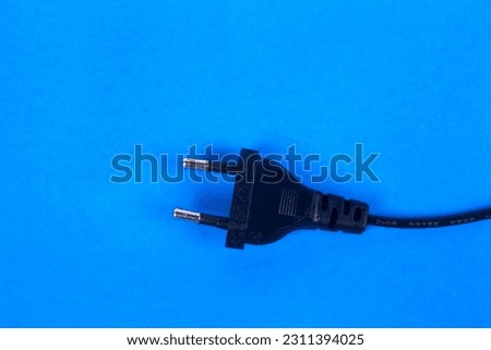 bipedal plug on blue background