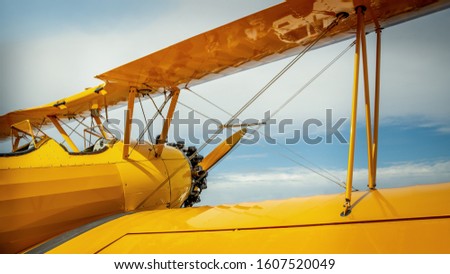 biplane against a blue sky
