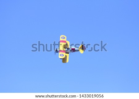 A biplane, historic single-engine plane.