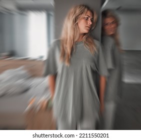 Bipolar, Depression And Scared Young Woman In A Bedroom With Worry, Fear And Stress. Insomnia, Mental Health Problem And Patient In Pain With Blur Motion, Anxiety And Schizophrenia At Mental Hospital