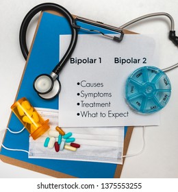 Bipolar Finding A Cure. Bipolar Causes, Symptoms, Treatment And What To Expect. Medical Diseases On A Clipboard.