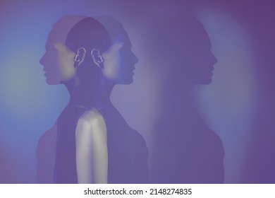 bipolar mental disorder. Double face. Split personality. Conceptual mood disorder. Dual personality concept. 2 silhouettes of a female head. mental health. Imagination.