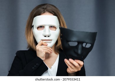 Bipolar Mental Disorder, Schizophrenia, A Woman Tries On Different Personalities In The Form Of Masks, Psychiatric Diseases