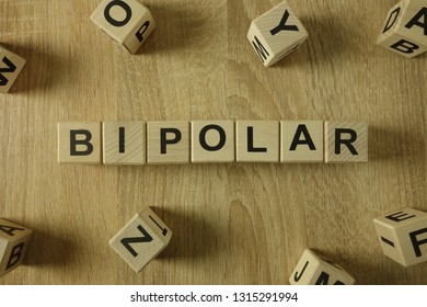 Bipolar Word From Wooden Blocks On Desk