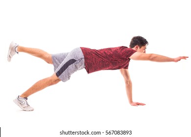 Bird Dog Plank. Young Man Doing Sport Exercise.