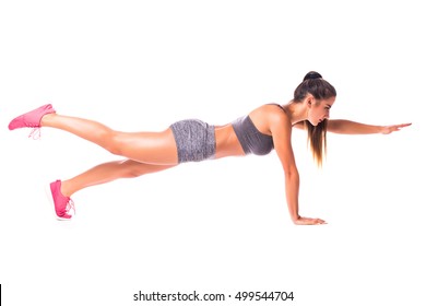 Bird Dog Plank. Young Woman Doing Sport Exercise.