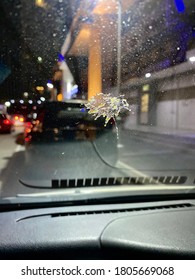 Bird droppings on cars at night.