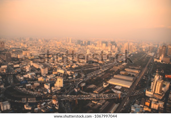 bird eye\
view of Bangkok city from tower with\
blur