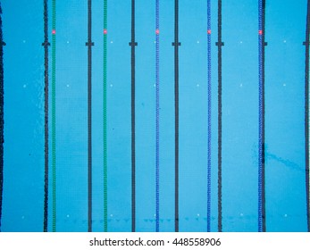 Bird Eye View of Blue Swimming Pool with Lane Lines.