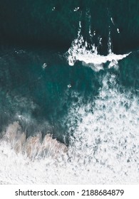 Bird Eye View From The Sky. Surfers Getting Waves From The Beachbreak.