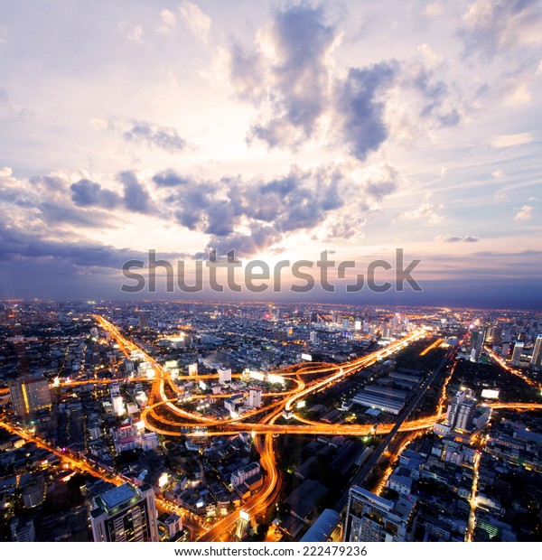 bird view of\
urban city traffic light trail\
