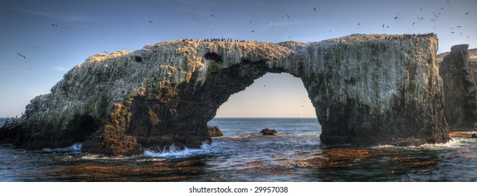 A bird-covered pierced rock near Anacapa Island, Channel Islands National Park, California
