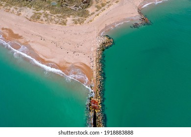 A Birdeye View Of A Groyne Down On A UK Beach